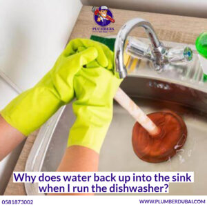 Why does water back up into the sink when I run the dishwasher?